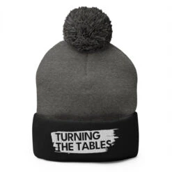 Turning The Tables | Pom-Pom Beanie -Noiré Store pom pom knit cap dark heather grey black front 667492070cbba 387955